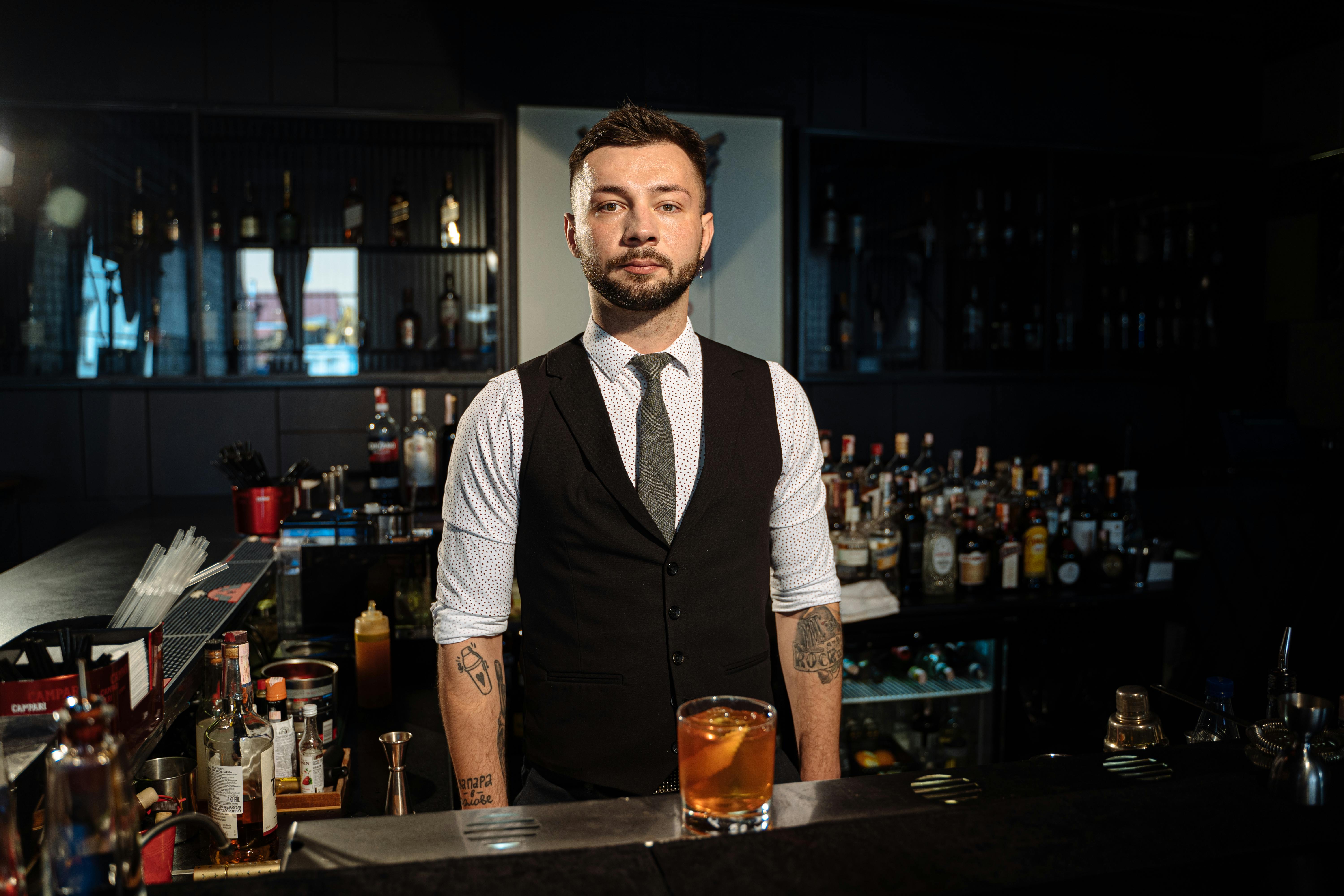 handsome bartender in club