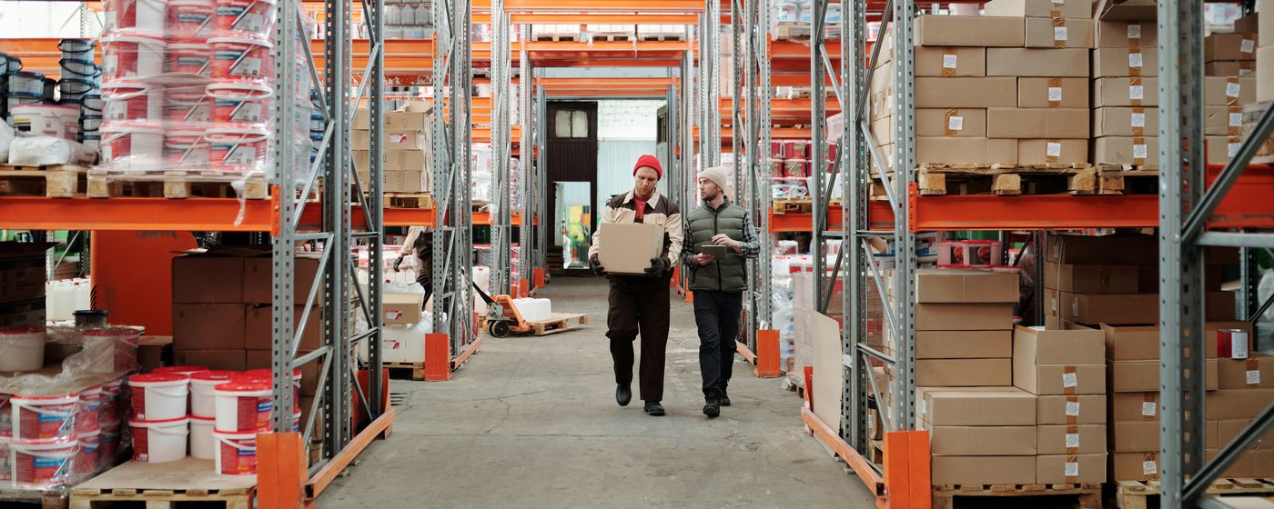 Warehouse workers moving inventory