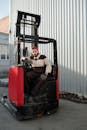 Man Sitting on a Forklift