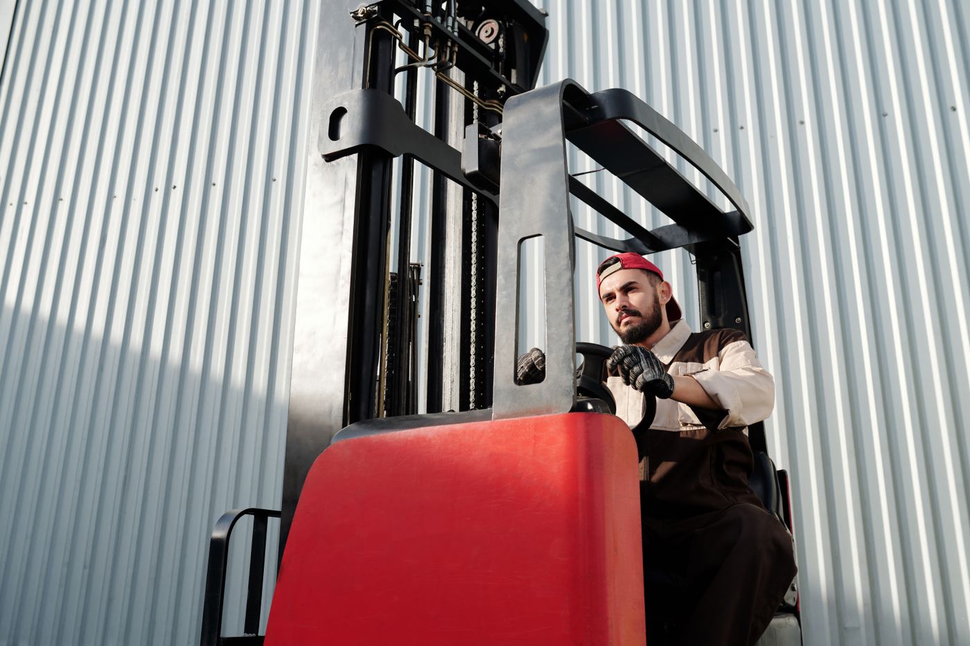 Forklift operator in industrial setting