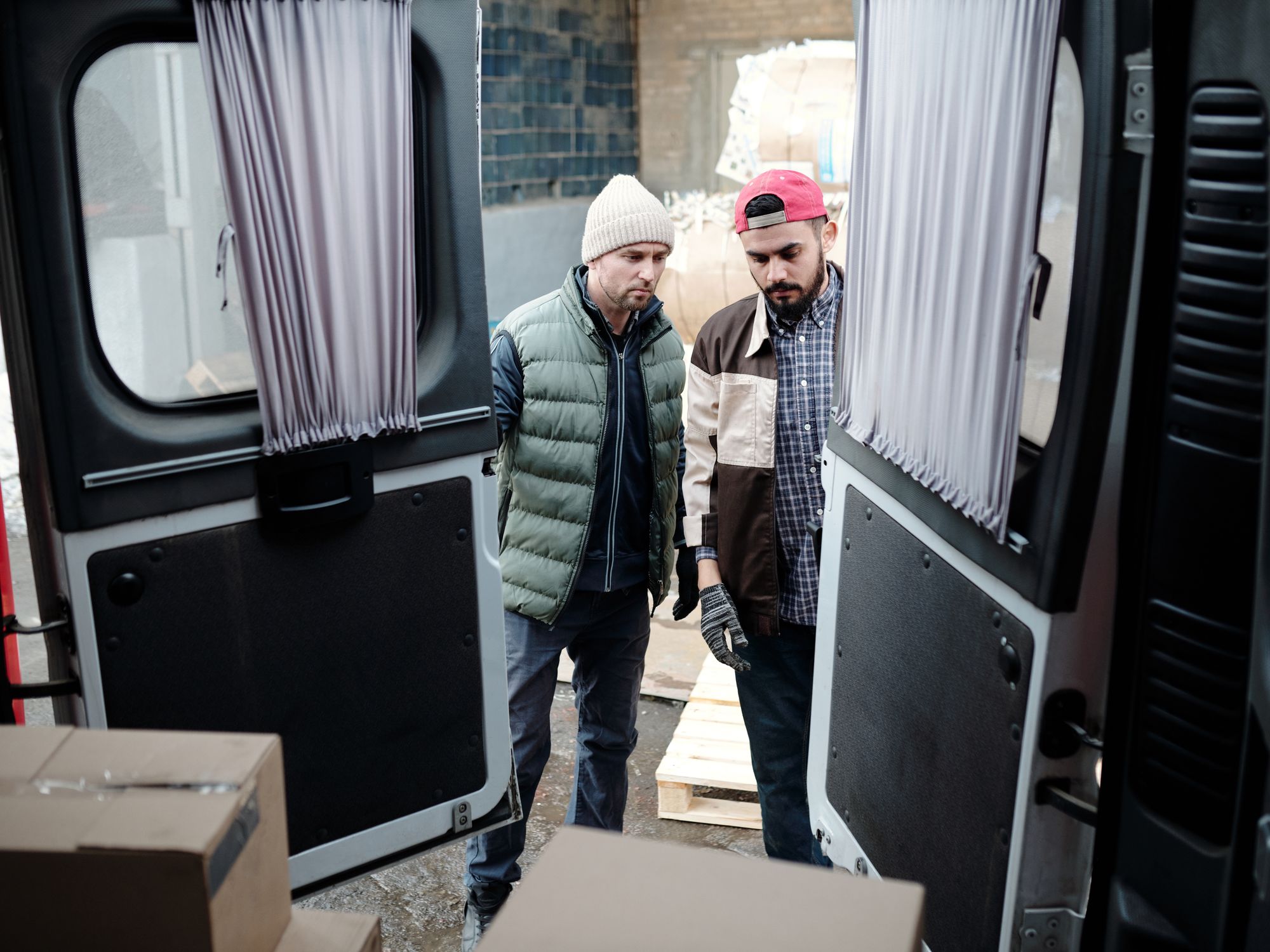 House Removals in Cromarty, Scotland — professional movers carrying furniture on a house move