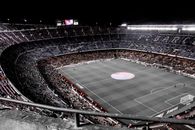 Modern football stadium with spectators on tribunes