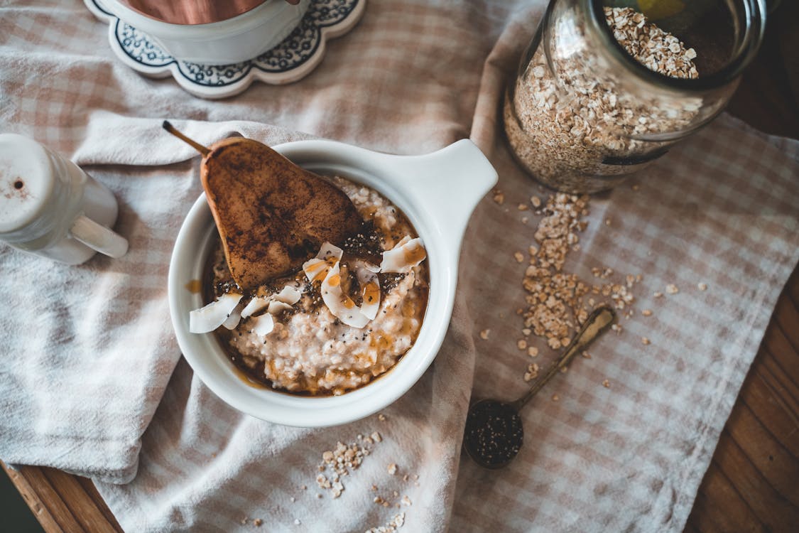 Free White Ceramic Bowl With Rice and Brown Bread Stock Photo