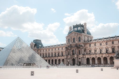 Free Scenery of landmark glass Pyramid on Louvre Museum square Stock Photo