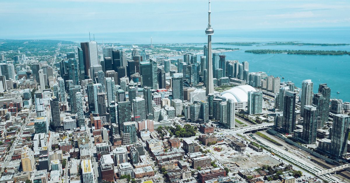 Toronto residential street of homes showing why the secondary suite refinance program matters for owners