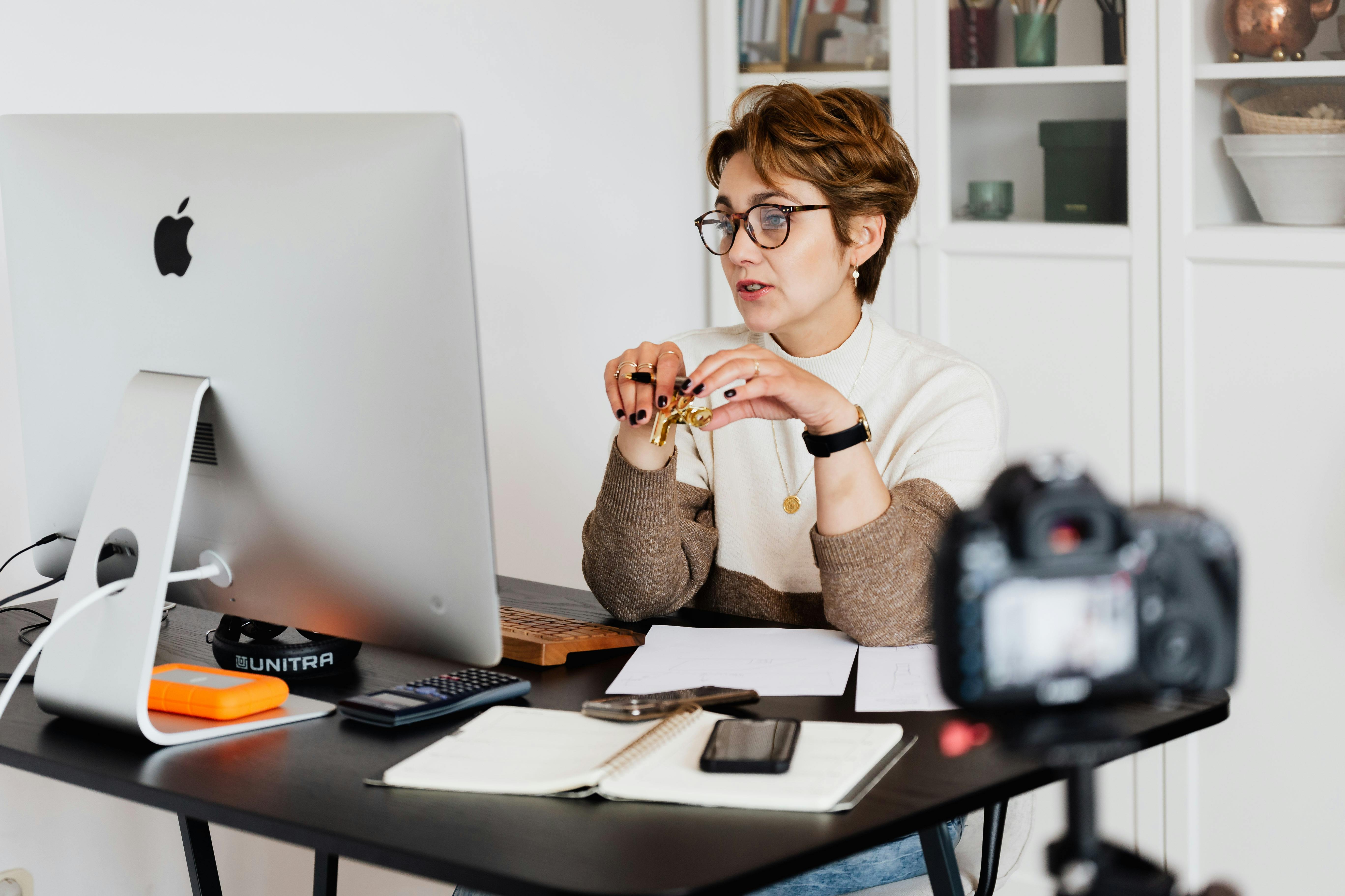 Woman hosting a webinar.