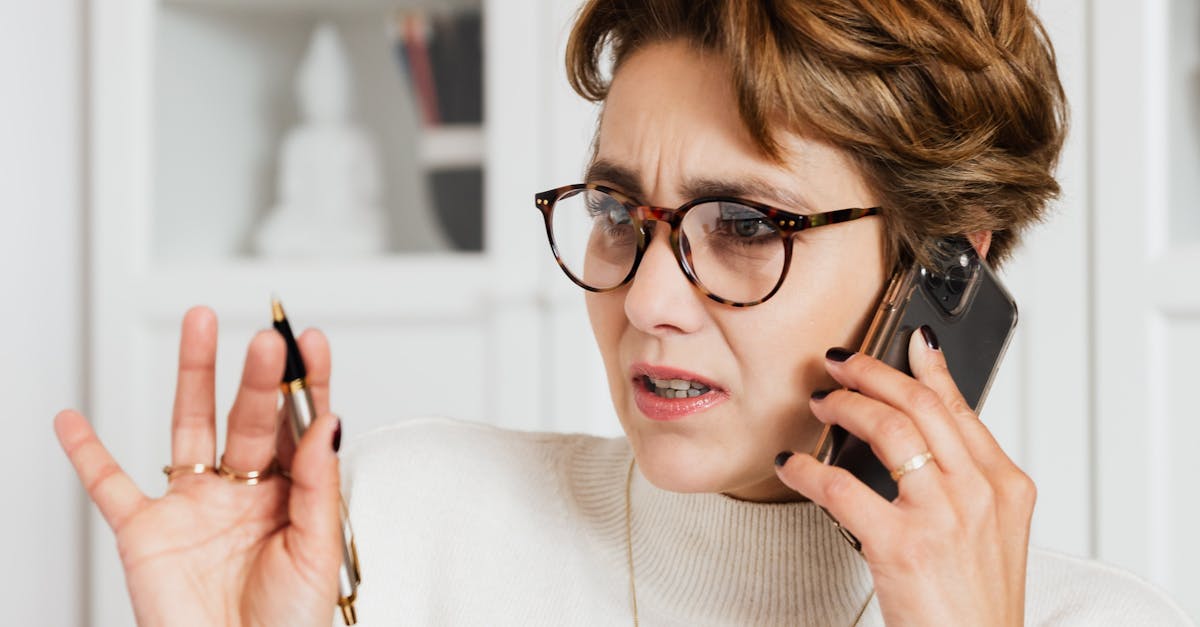 Woman talking on phone with confused face · Free Stock Photo