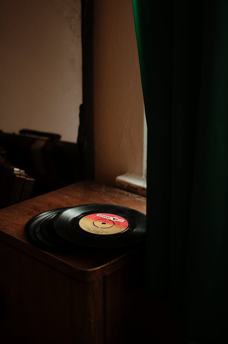 Classic Vinyl Record Placed On Wooden Table