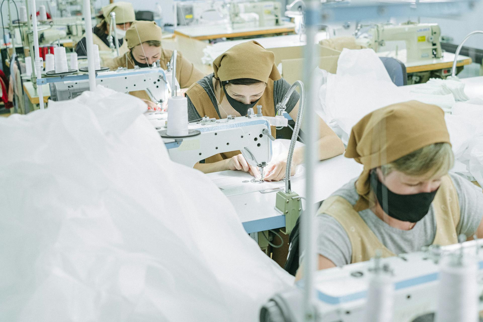 Women Sewing Fabrics in a Factory