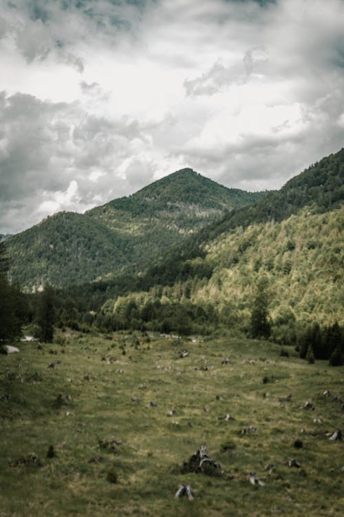 Cloudy sky over green mountainous valley