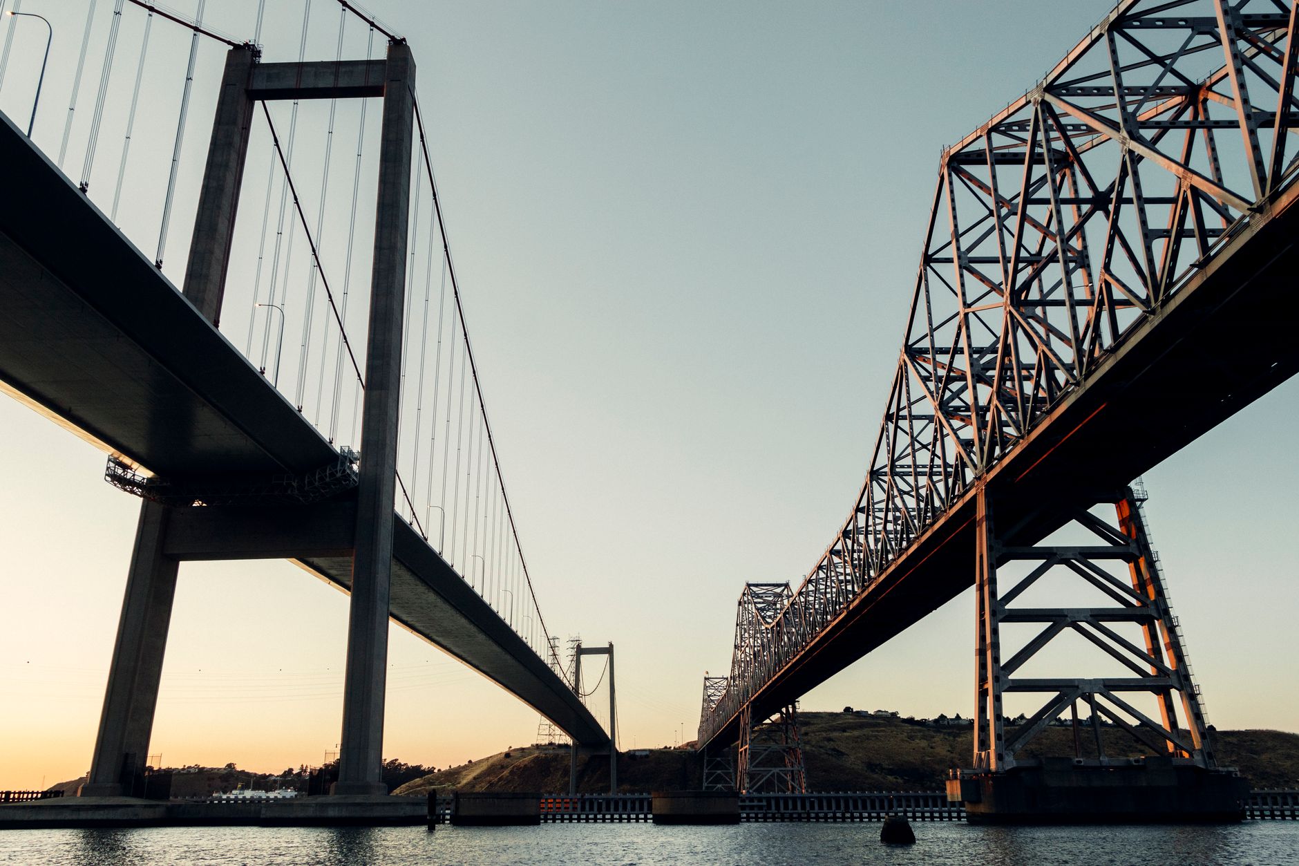 Carquinez Bridge in Crockett, CA captured at sunset showcasing impressive steel architecture.