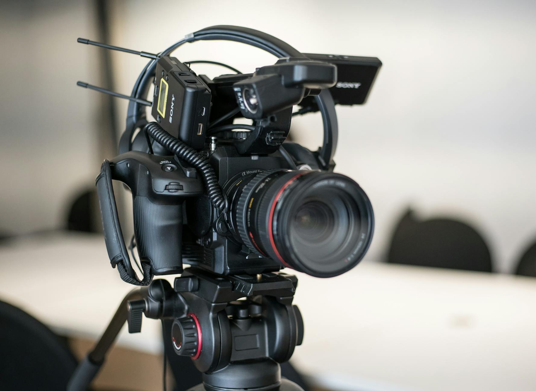 A close-up of an external hard drive plugged into a laptop