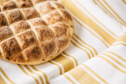 Homemade fresh baked bread on table