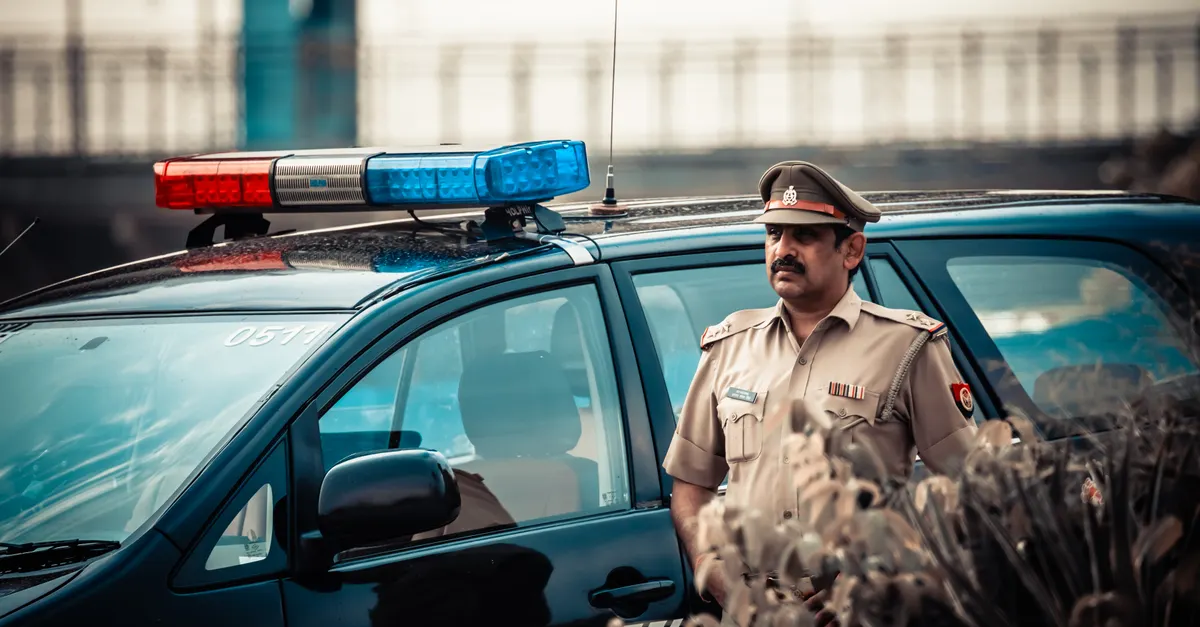 Police station front desk with a register and pen, representing FIR registration for cognizable offences
