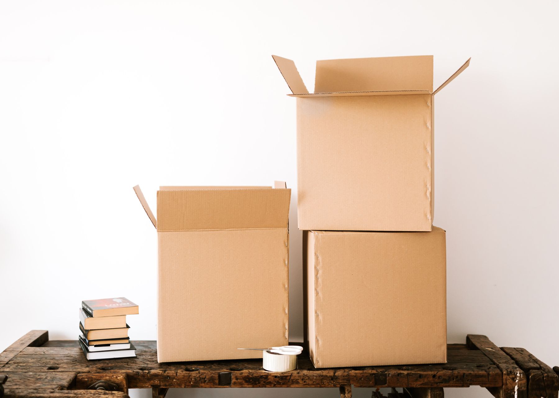 House removals in Glasgow — crew wrapping and loading on moving day