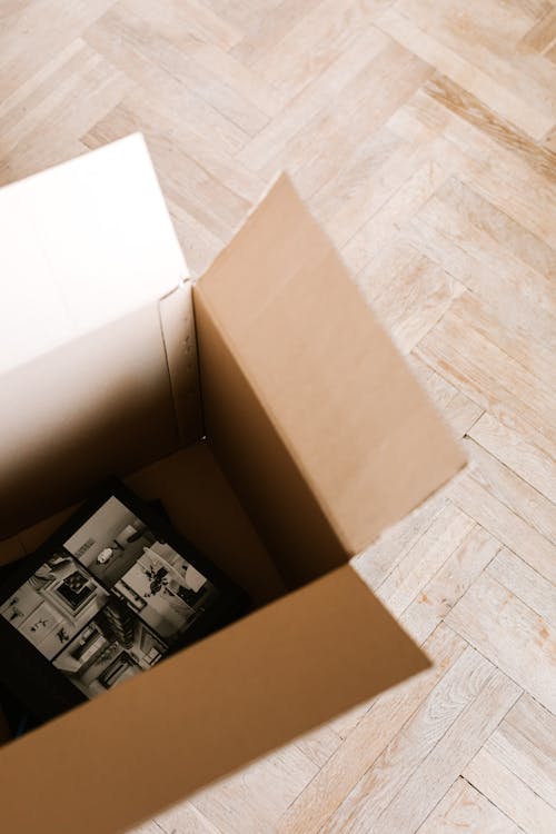 Stack of books placed in carton box