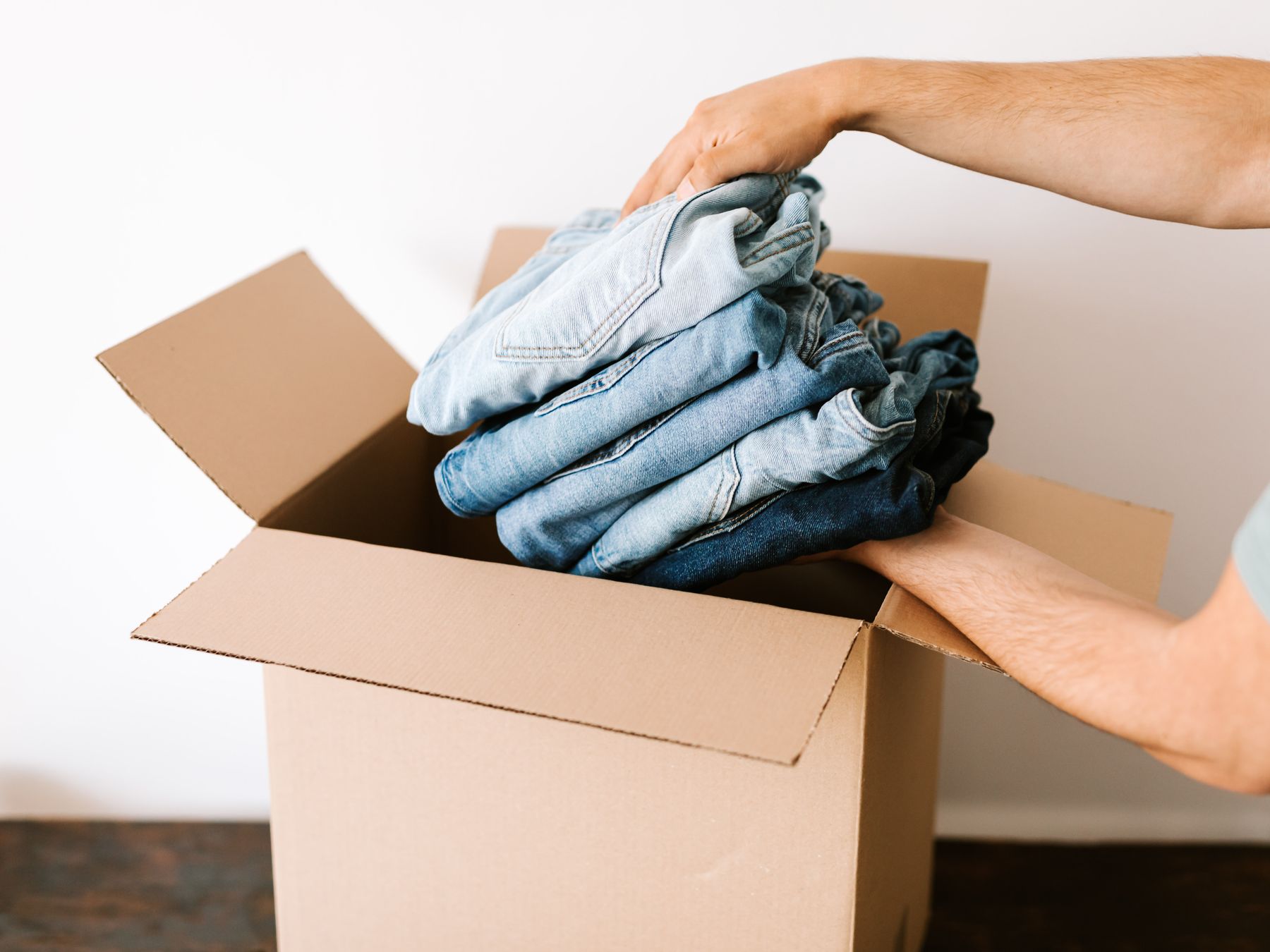 Simister — house clearance team loading furniture into a van