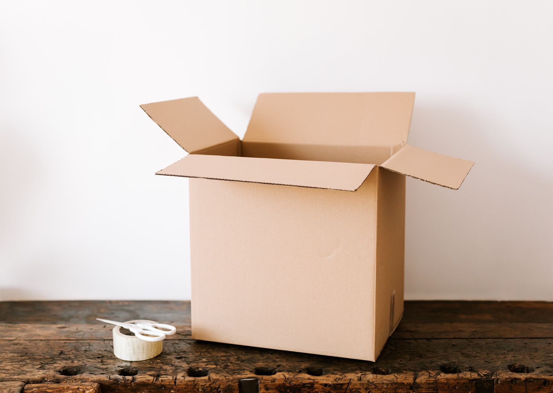 House removals in Barrhead — crew wrapping and loading on moving day