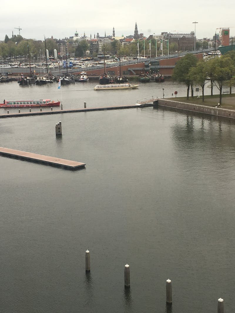 Mature woman in silk robe revealing cleavage, seductive expression