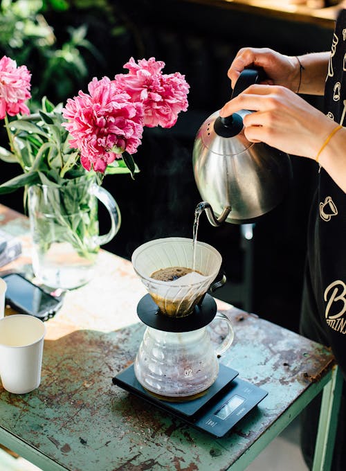 Free A Person Making Pour Over Coffee Stock Photo