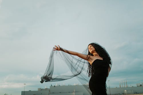 Woman in Black Tube Dress and Black Veil