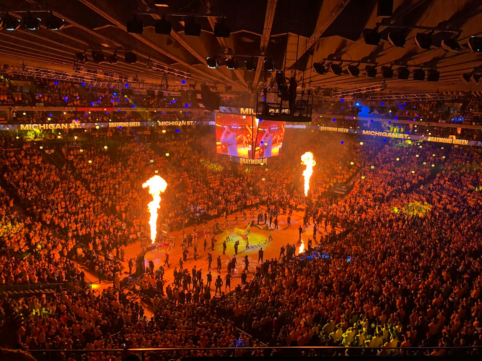 Large basketball arena crowd during a game