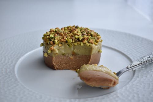 Delicious dessert with pistachio topping