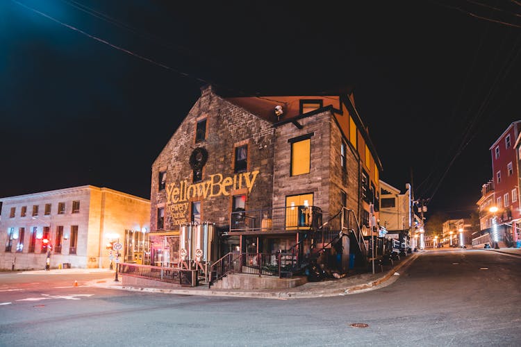 Old Restaurant Facade On Empty City Street At Night