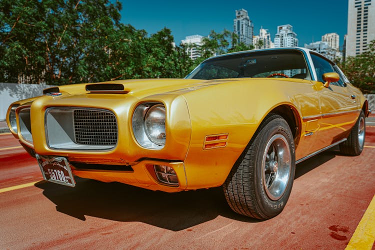 Yellow Pontiac Car