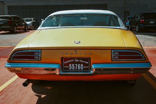 Photo of Yellow Pontiac Car