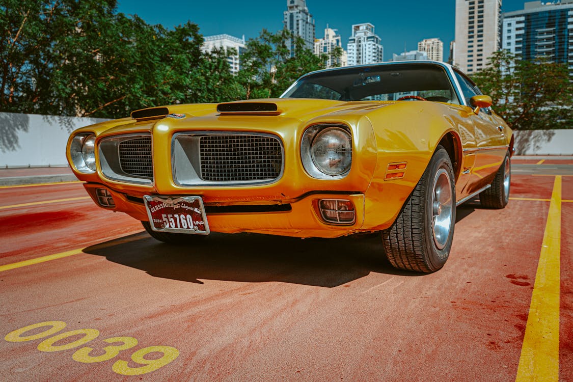 Photo of Yellow Pontiac Car