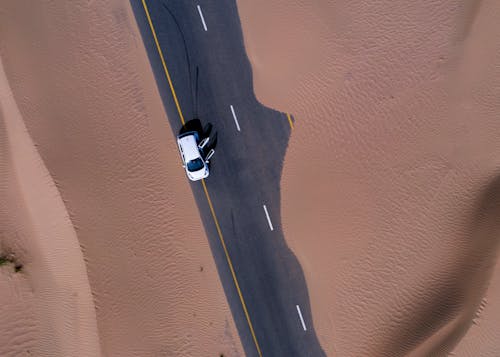 Aerial View of White Car on Road