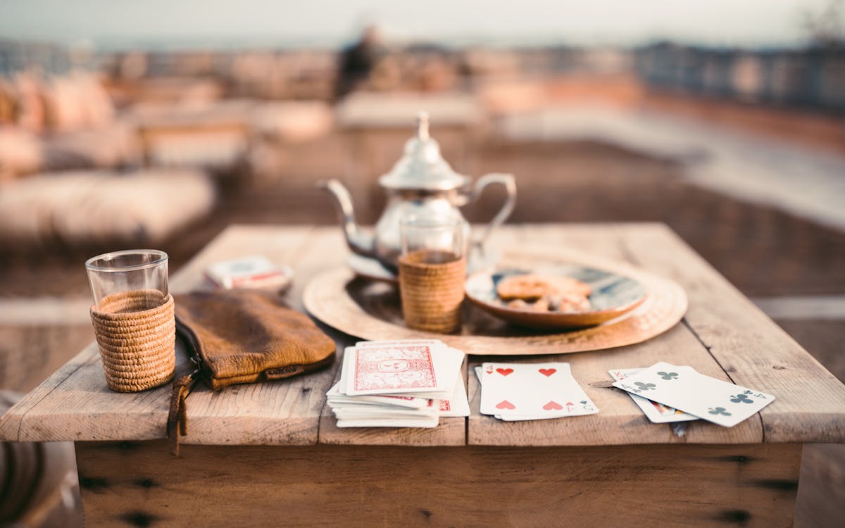 White Ceramic Teapot on Brown Wooden Table