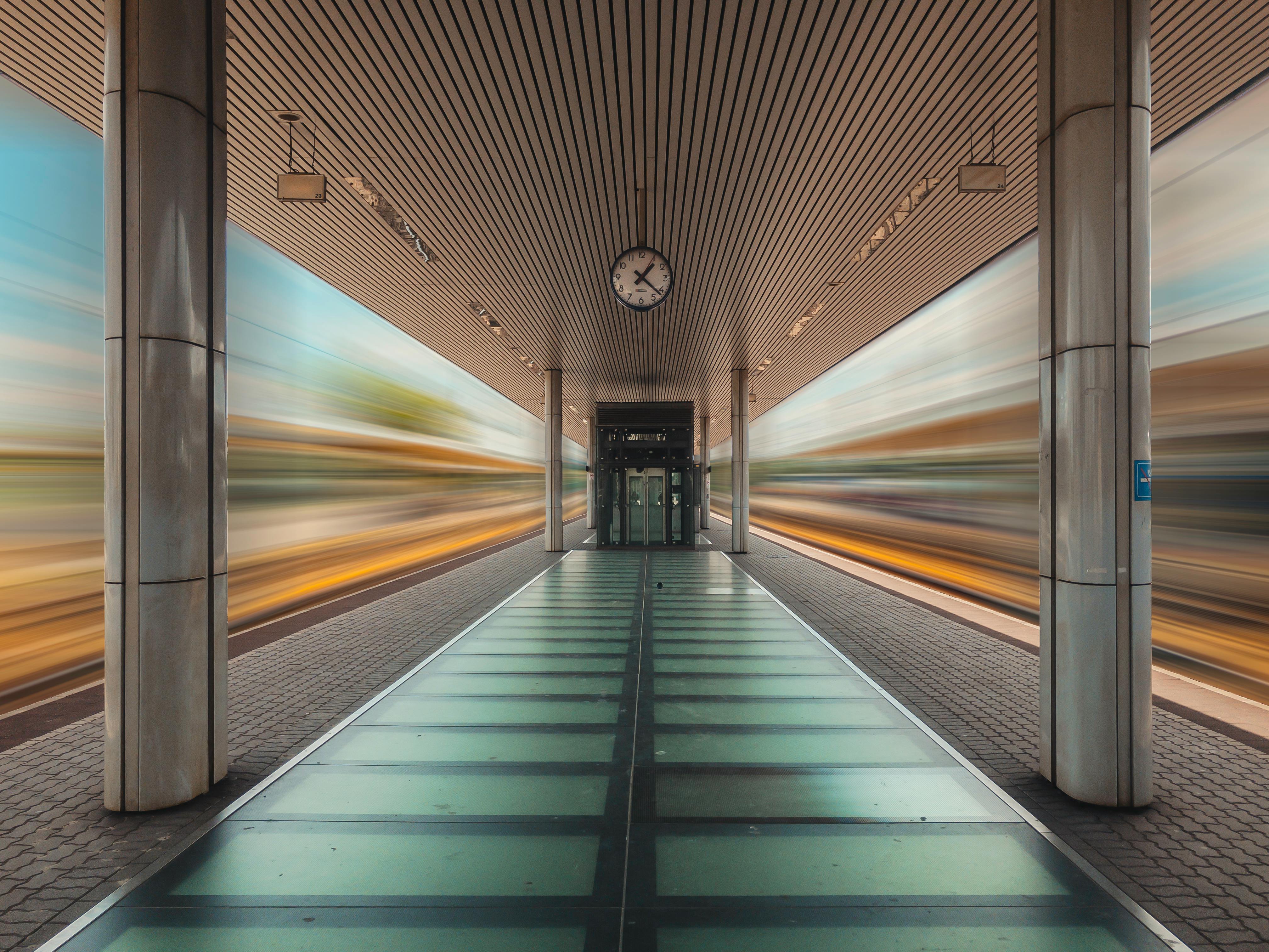 Long exposure shot capturing motion blur of trains in Budapest subway station, Hungary.