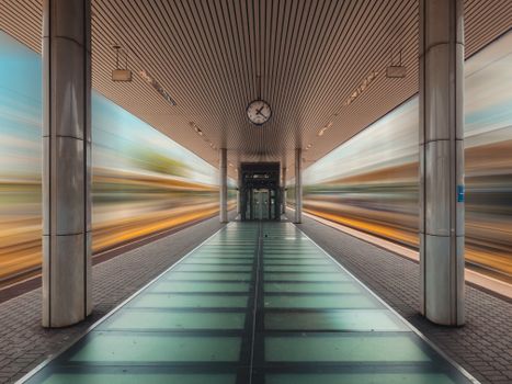 Long exposure shot capturing motion blur of trains in Budapest subway station, Hungary.