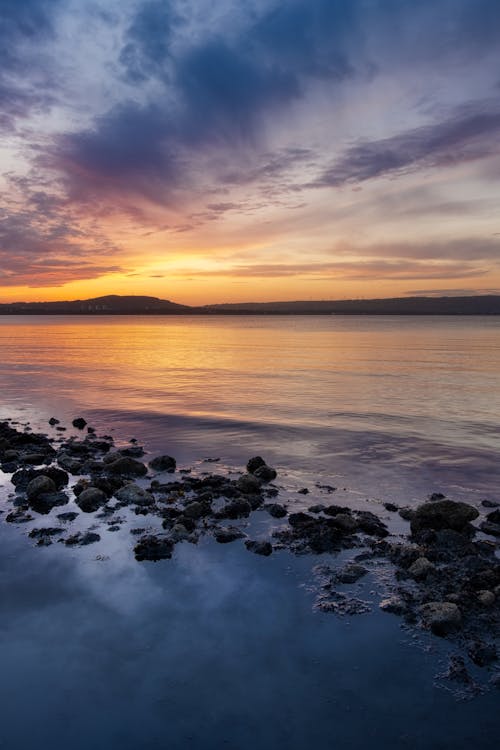 Body of Water During Sunset