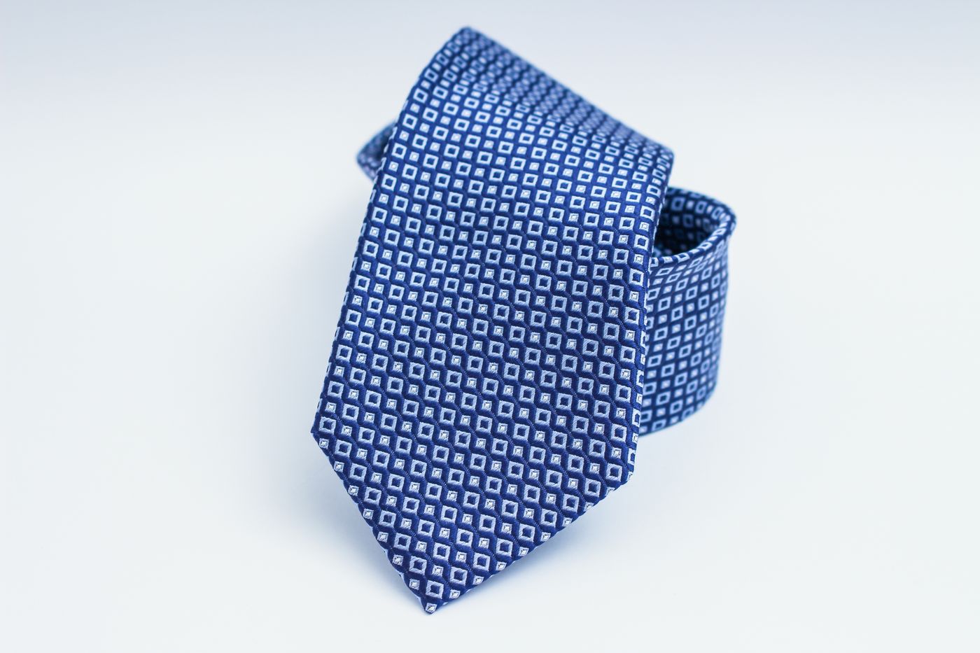 Detail of woven cloth and finished necktie