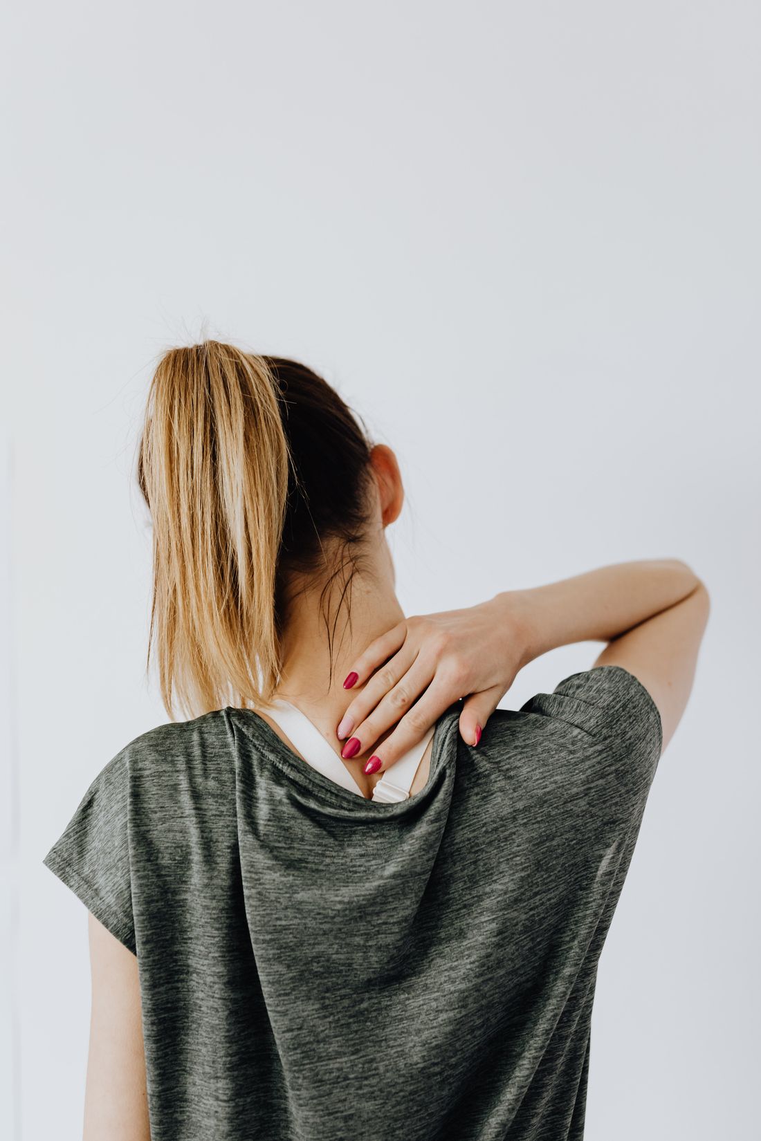Therapist treating a patient’s neck and upper back