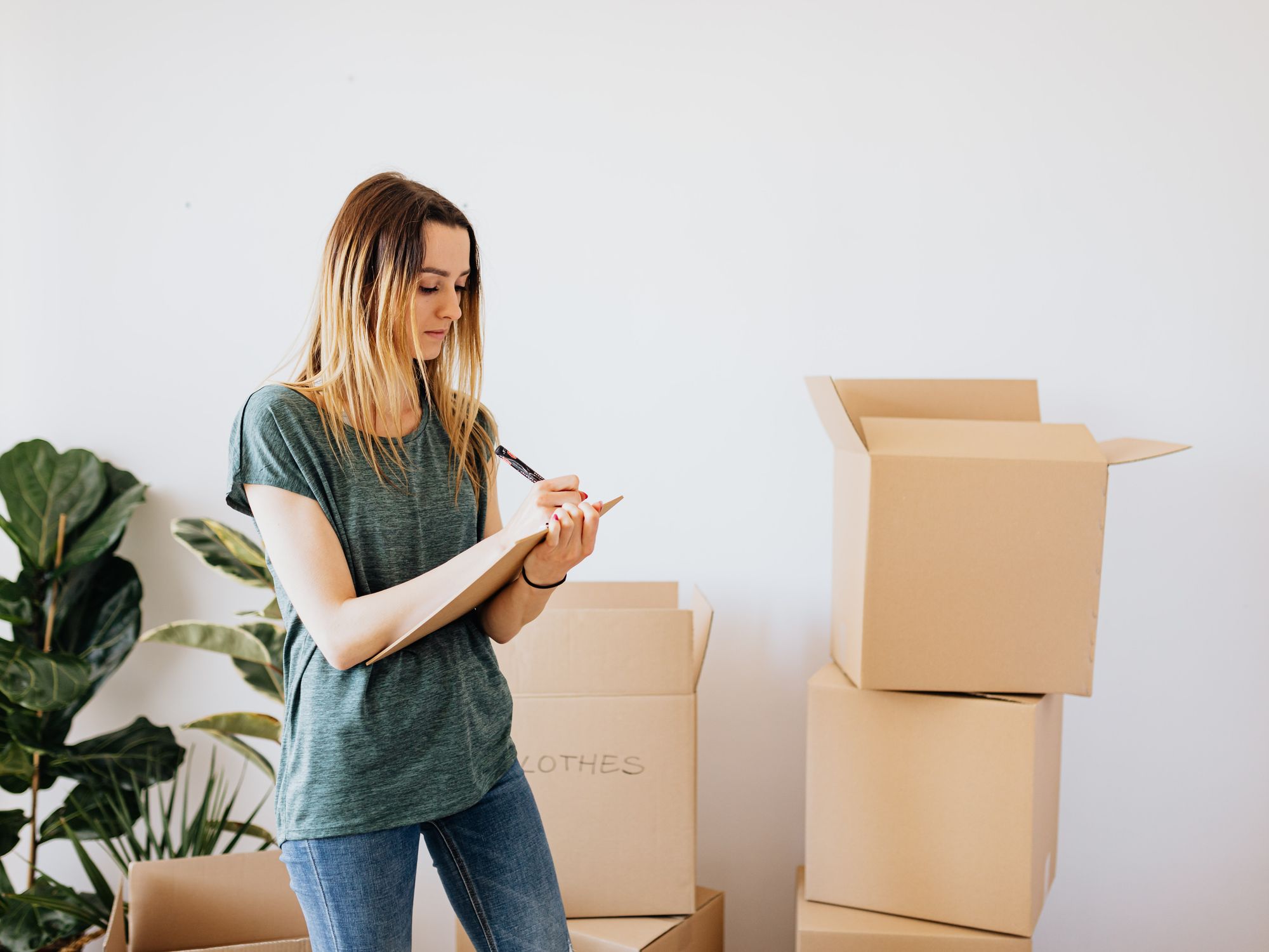 Flat Removals in Marsden, Yorkshire — movers carrying boxes for a flat move