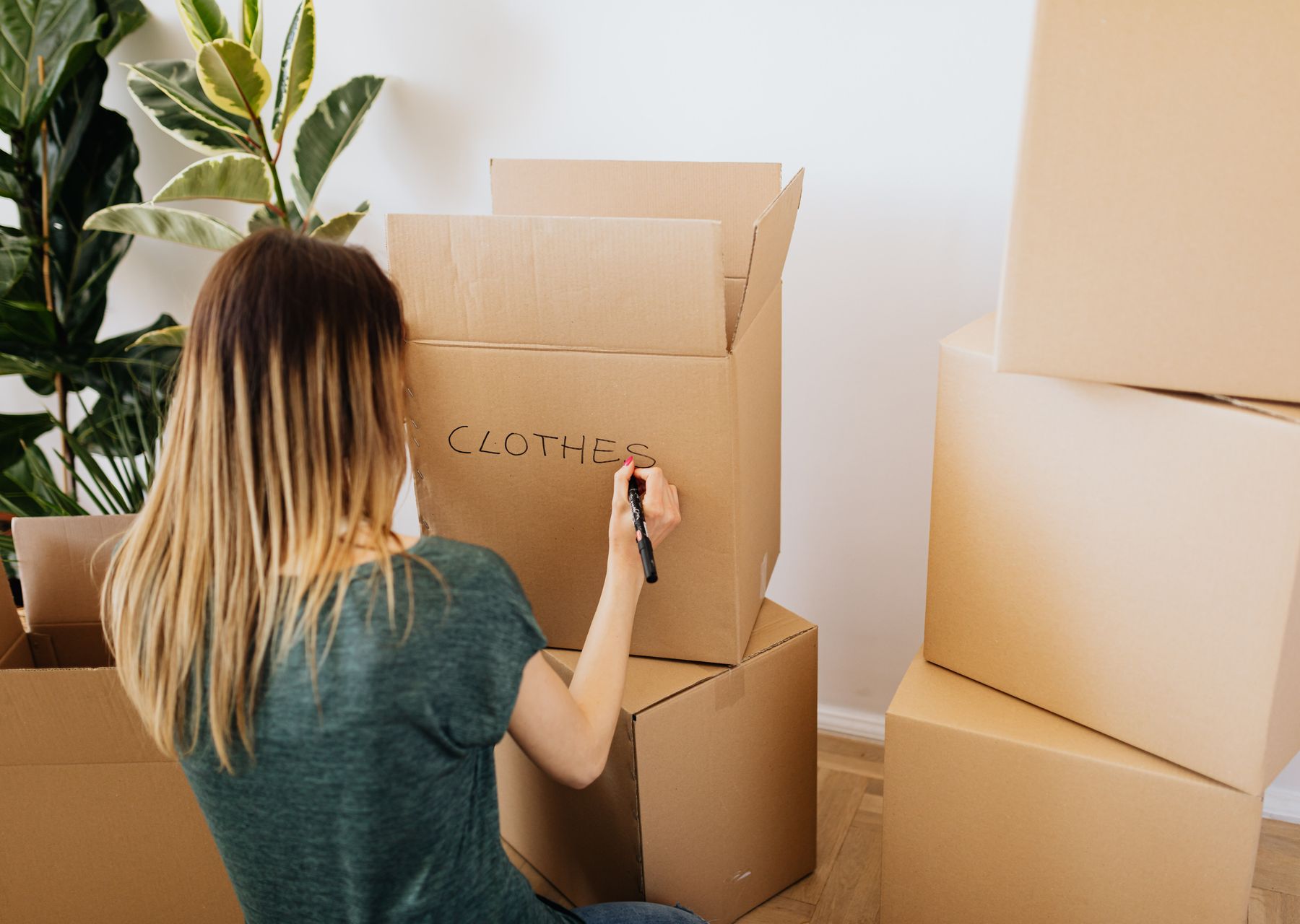 Same day removals in Undy — crew wrapping and loading on moving day