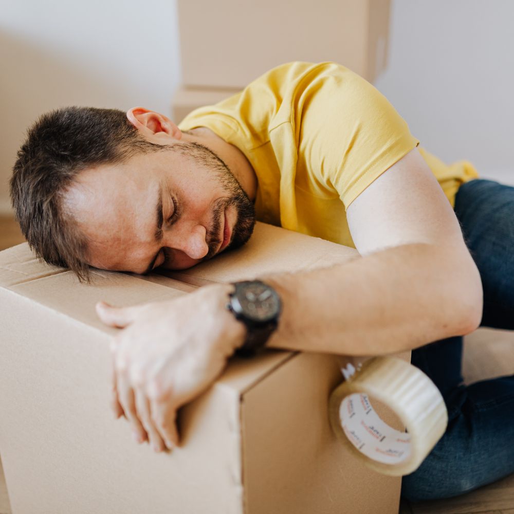 Hackney Downs — movers carrying boxes for a flat move