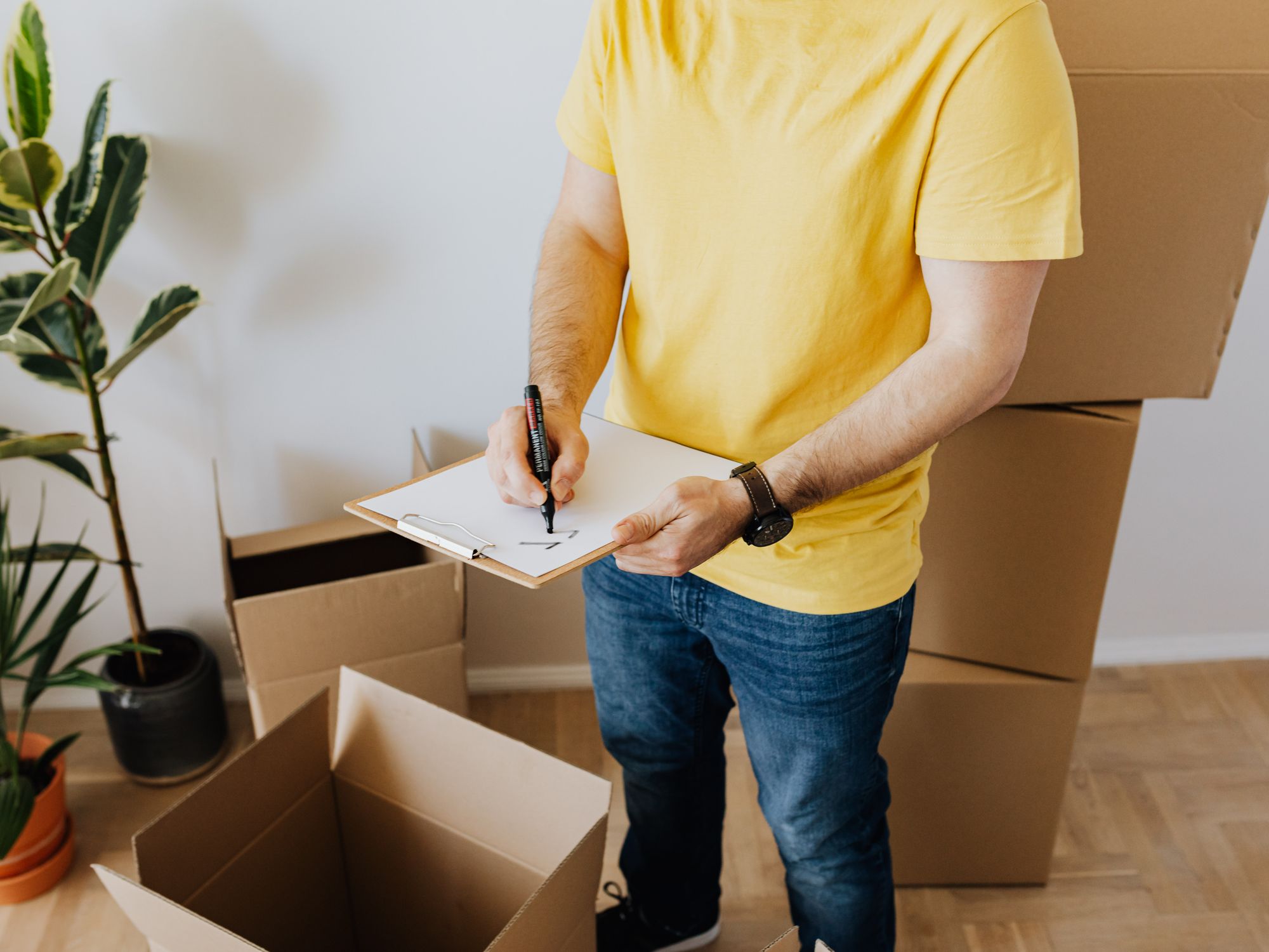 Packing & Materials in West Byfleet, M25 Fringe — professional packers wrapping and boxing belongings