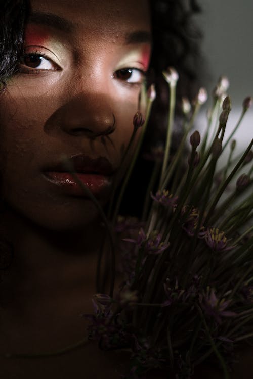 Woman in Purple Flower Field