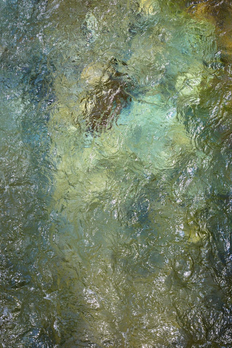 Clear River Water Rippling In Nature