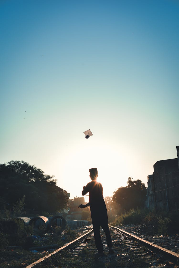 A Person Flying  A Kite