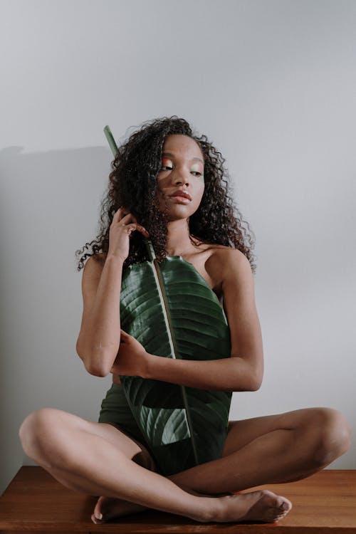 Woman in Green Sleeveless Dress