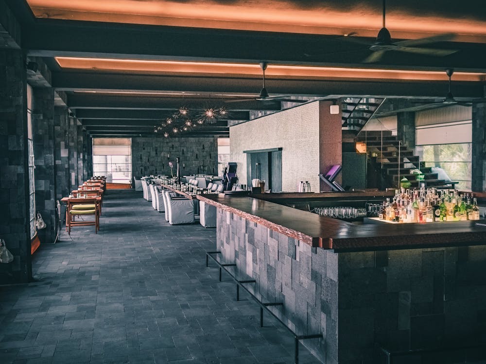 Free Modern interior of restaurant in dark tones Stock Photo