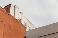 Old residential building corner with annexes