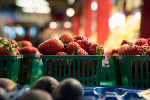 Free Red Strawberries on Green Plastic Basket Stock Photo