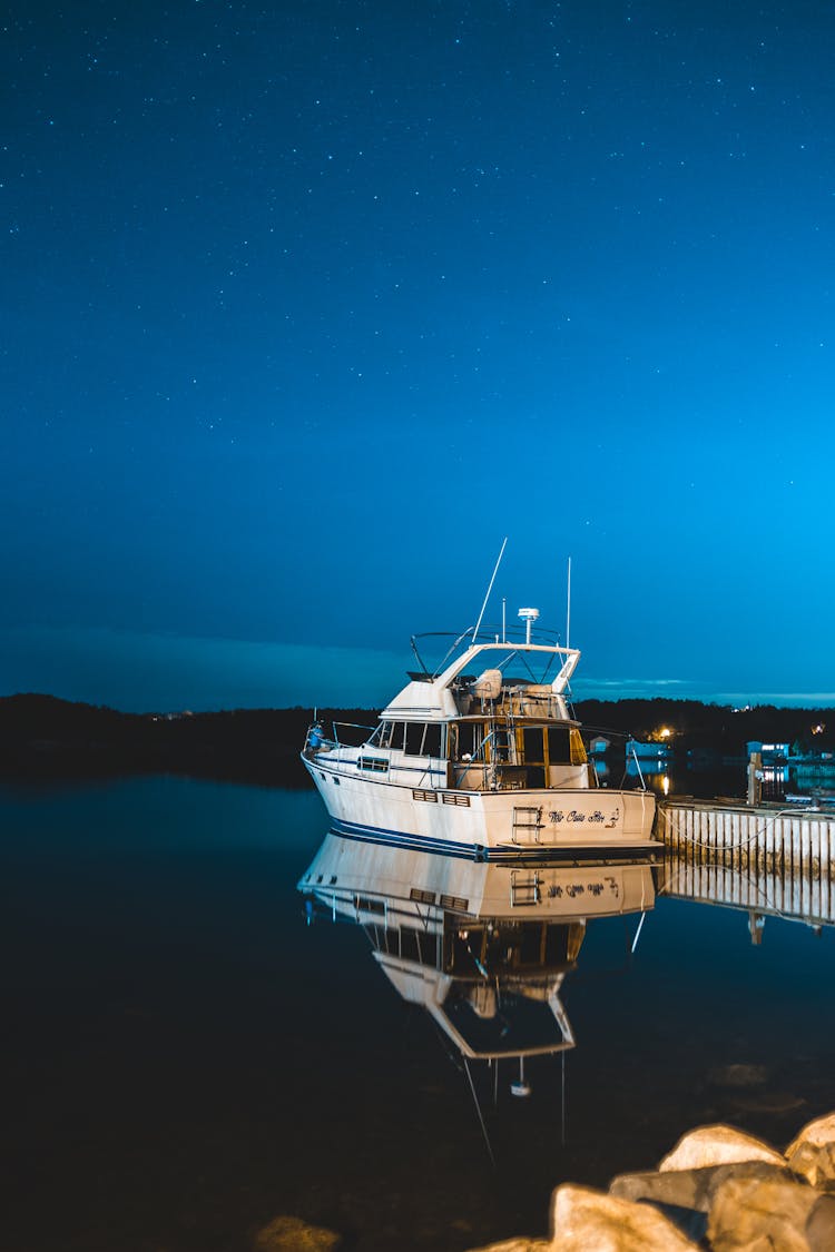 Photo Of Fishing Boat On Dock During Night Time